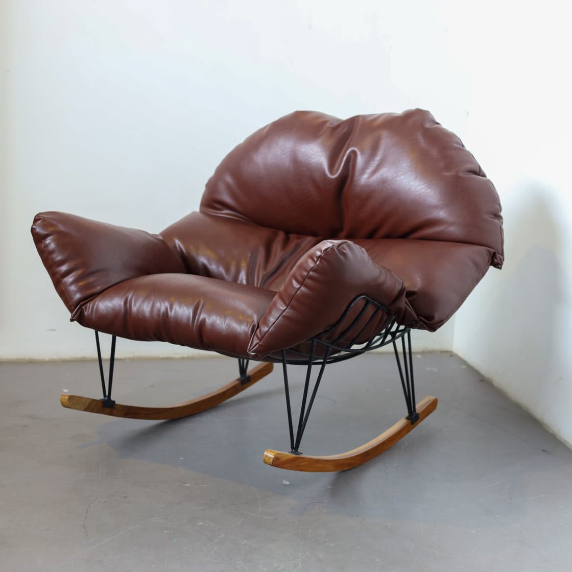 Nima Cushioned Rocking Chair